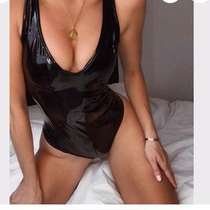 Black (faux) leather/latex body suit